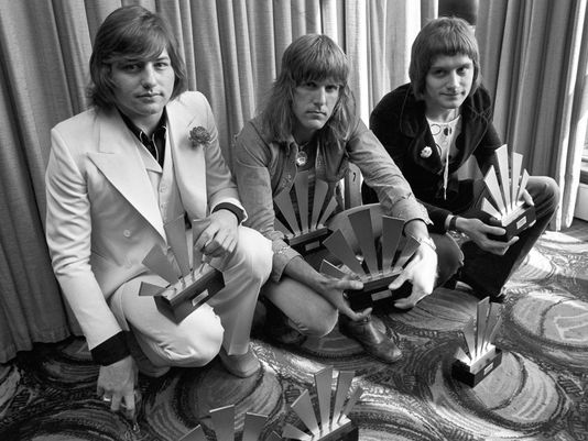 Greg Lake (left) in a 1972 ELP photo with Keith Emerson and Carl Palmer. (Source: AP)